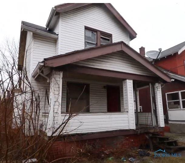 view of home's exterior with a porch