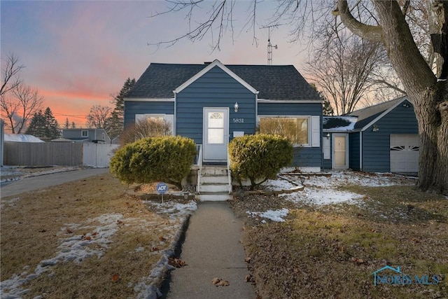 bungalow-style house with a garage