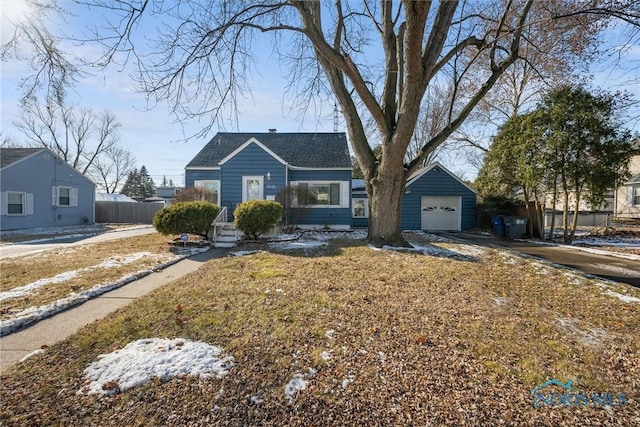 view of front of house featuring an outbuilding and a garage