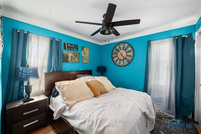 bedroom featuring ceiling fan