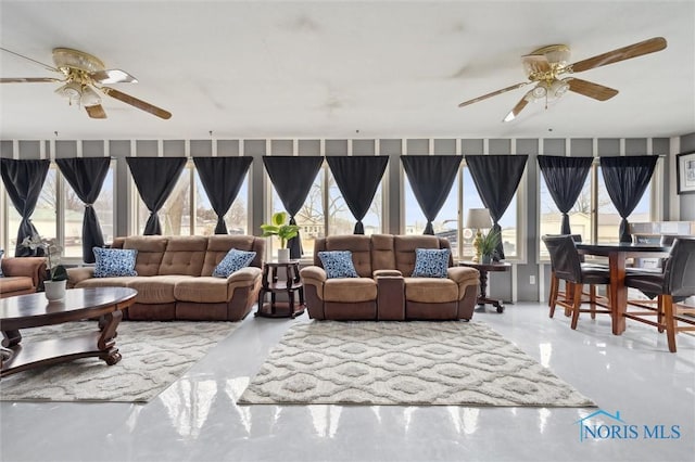 interior space featuring ceiling fan