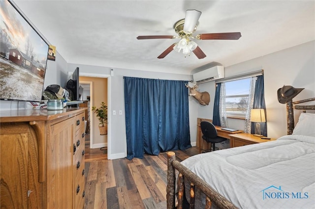 bedroom featuring dark wood-type flooring, ceiling fan, and a wall unit AC