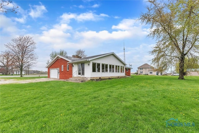 ranch-style home with a front lawn