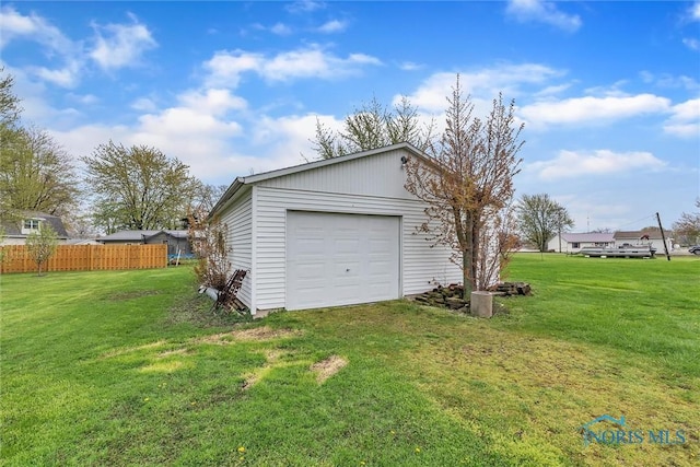 garage with a lawn