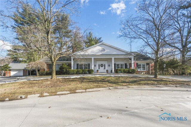 view of greek revival inspired property