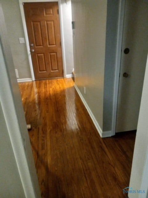 hall featuring dark hardwood / wood-style floors