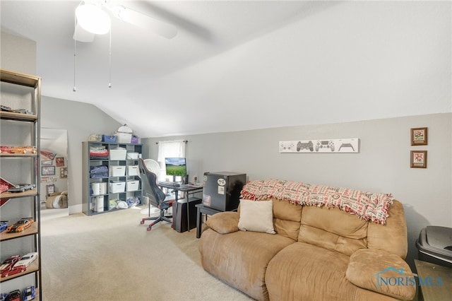 office area featuring vaulted ceiling, ceiling fan, and carpet