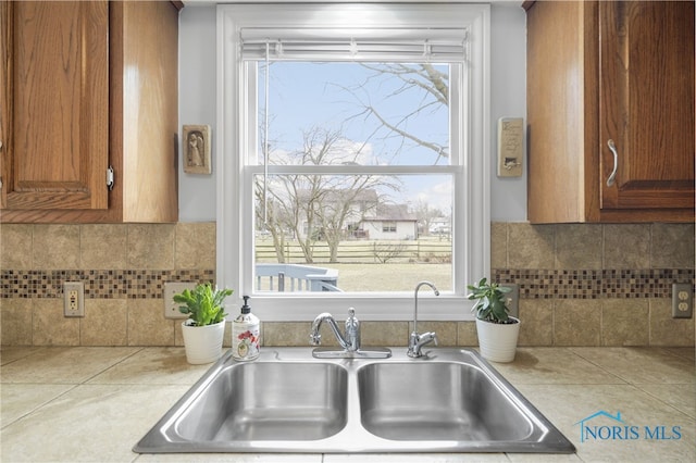 kitchen with sink and backsplash