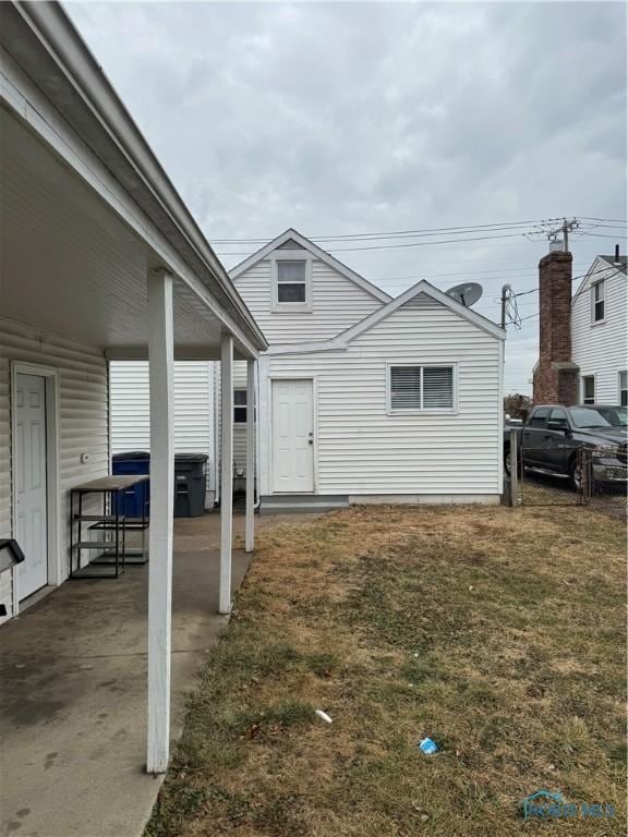 exterior space with a carport