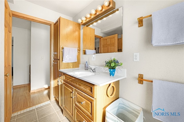 bathroom featuring vanity and tile patterned floors