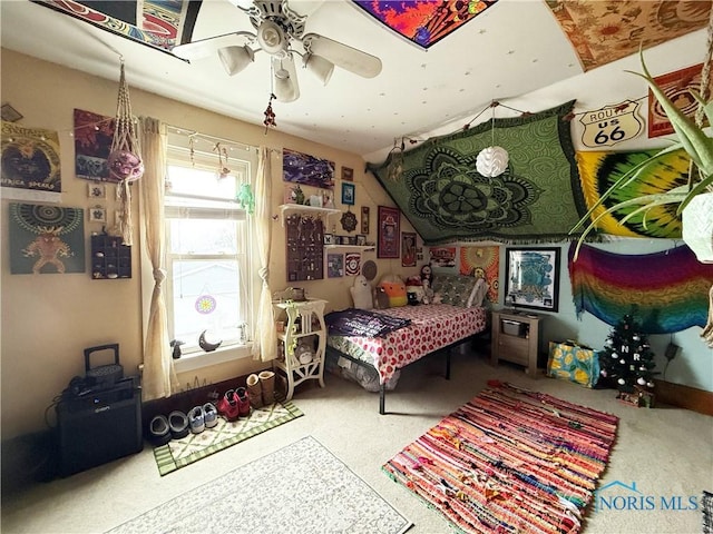 carpeted bedroom featuring ceiling fan