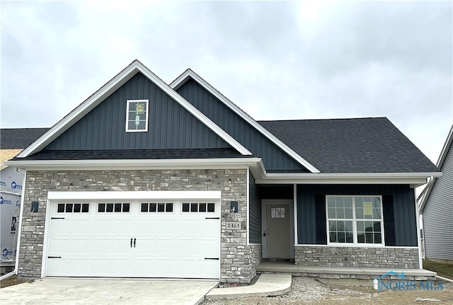 craftsman house with a garage