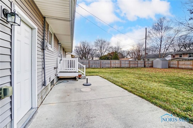 view of patio featuring a storage shed