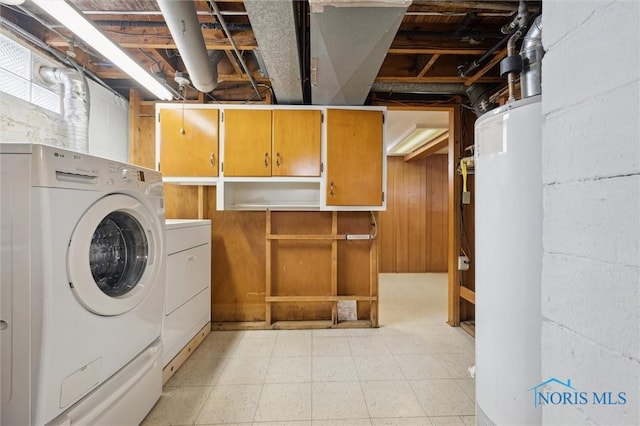 laundry area featuring washing machine and dryer and gas water heater