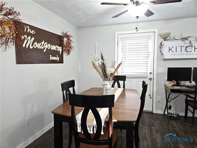 dining space with dark hardwood / wood-style floors and ceiling fan