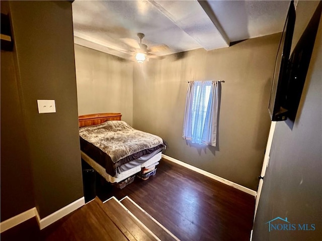 bedroom featuring hardwood / wood-style flooring and ceiling fan