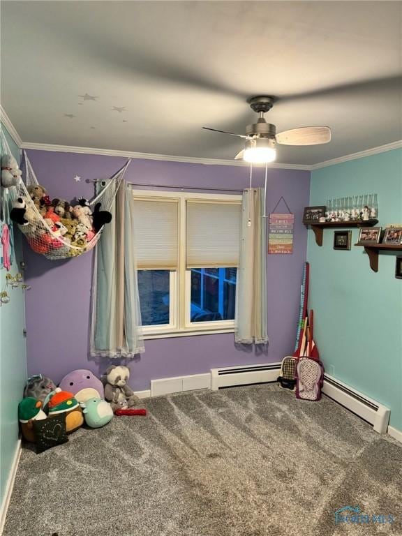 unfurnished bedroom with ornamental molding, carpet, a baseboard heating unit, and ceiling fan