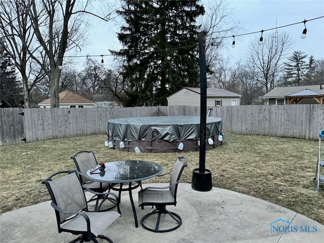 view of patio with a covered pool