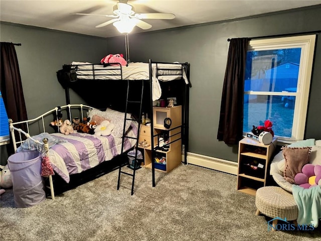 carpeted bedroom with a baseboard radiator and ceiling fan