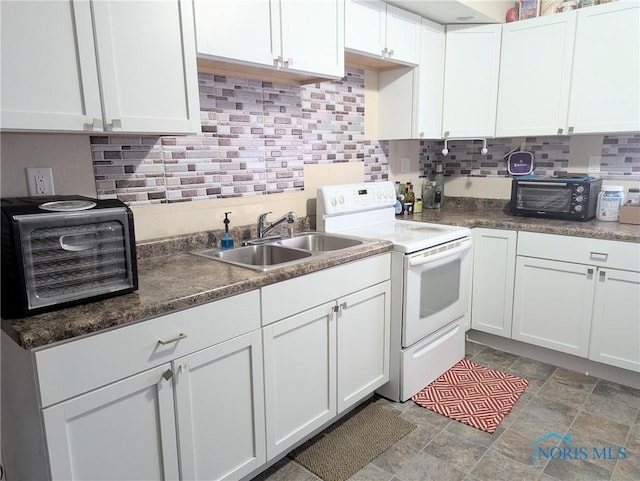 kitchen with white electric range, sink, and white cabinets