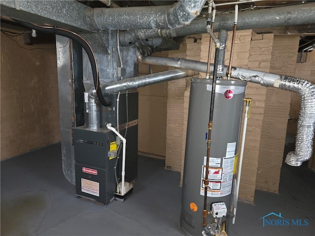 utility room featuring gas water heater