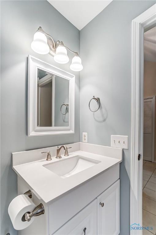 bathroom with vanity and tile patterned floors