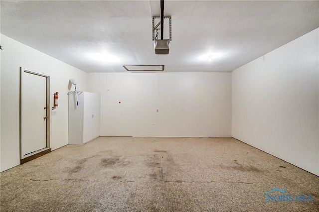 32 Abbey Rd, Perrysburg, OH 43551 - garage featuring a garage door opener