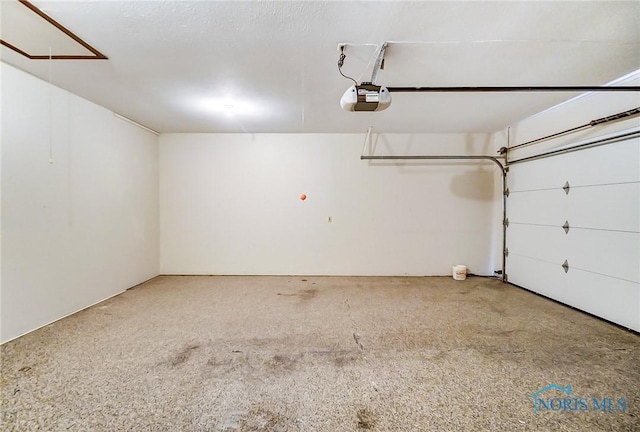 32 Abbey Rd, Perrysburg, OH 43551 - garage with a garage door opener