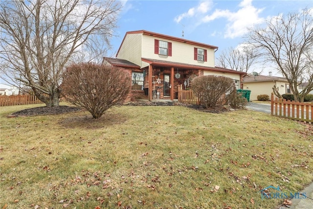 front of property with a porch and a front yard