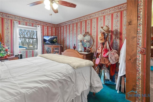 carpeted bedroom with ceiling fan