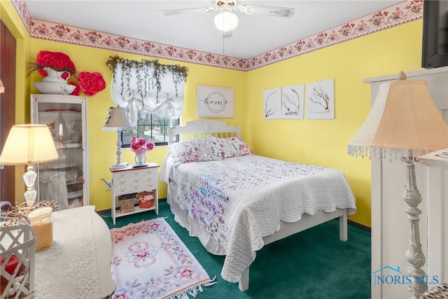 bedroom with ceiling fan and carpet flooring