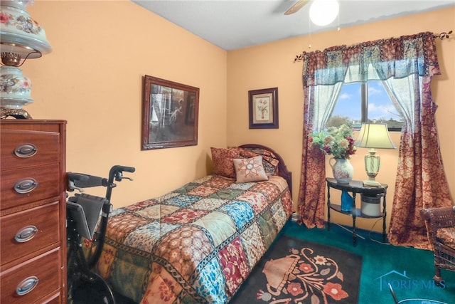 carpeted bedroom with ceiling fan