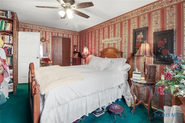 bedroom with ceiling fan and carpet