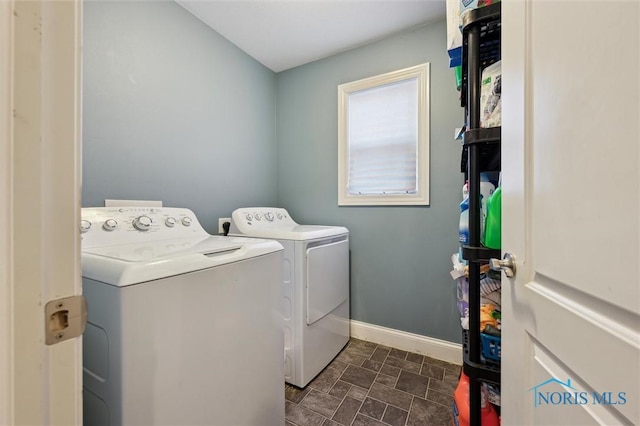 laundry room with independent washer and dryer