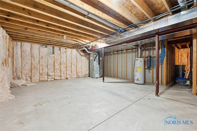 basement featuring heating unit and gas water heater