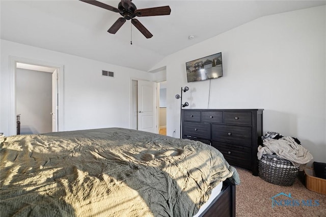 bedroom featuring vaulted ceiling, carpet, and ceiling fan