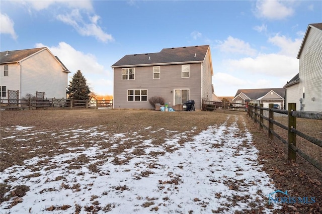 view of snow covered property