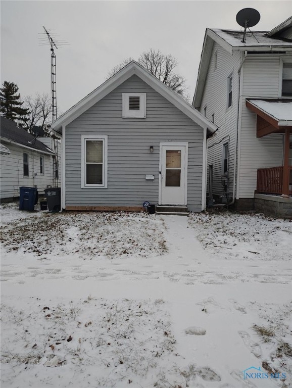 view of snow covered house