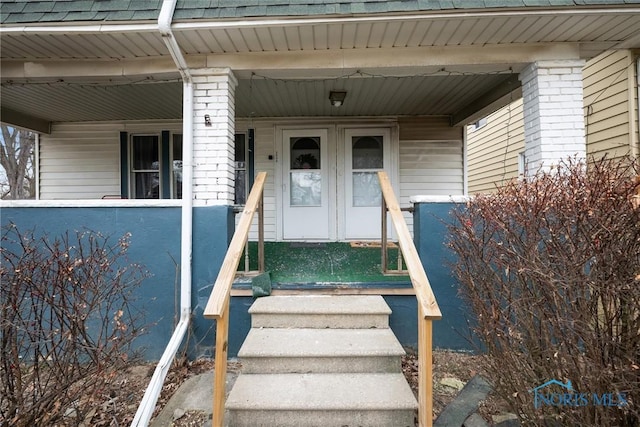 entrance to property with a porch