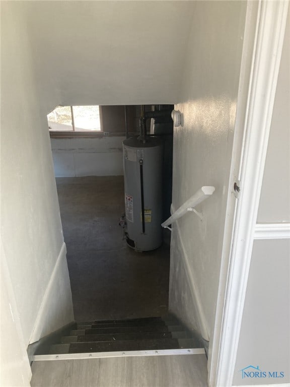 staircase with gas water heater