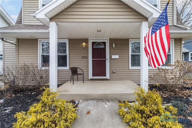 entrance to property with covered porch