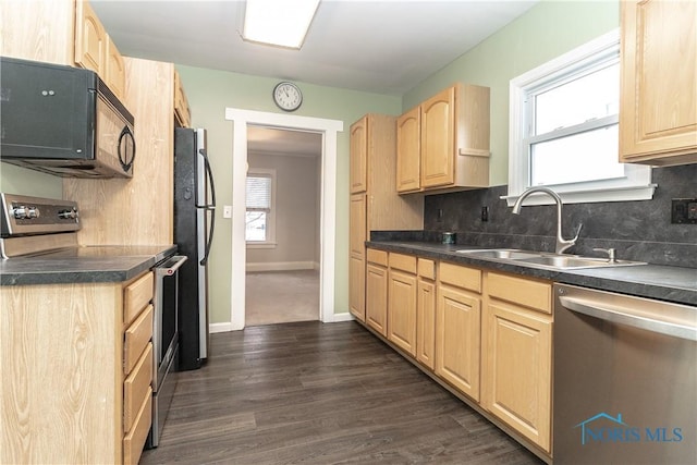 kitchen with backsplash, stainless steel appliances, sink, and light brown cabinets