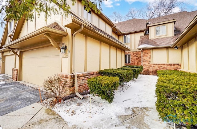 view of property exterior with a garage