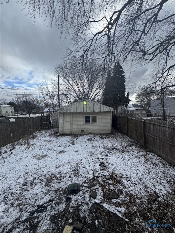 view of yard covered in snow