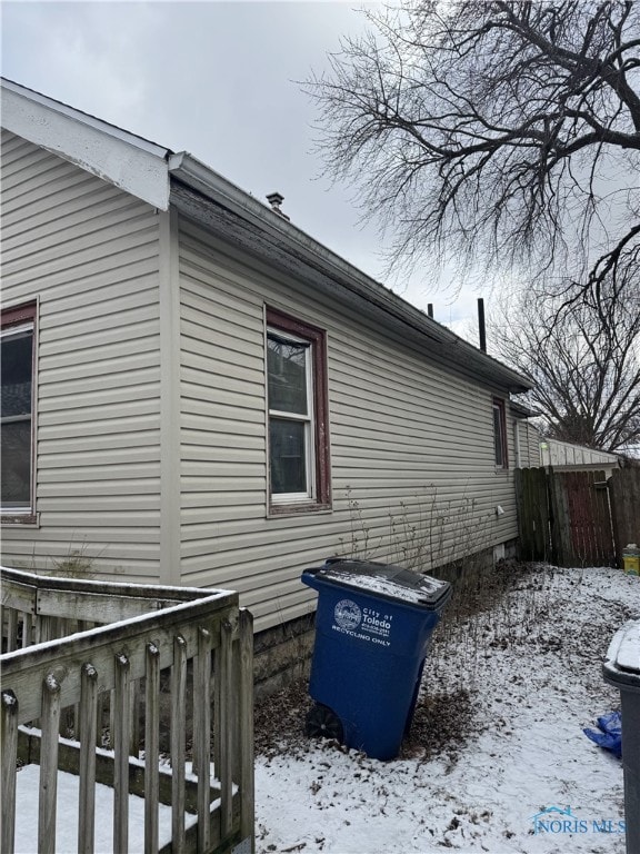 view of snow covered property