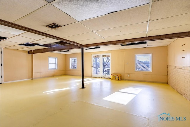 basement with a drop ceiling