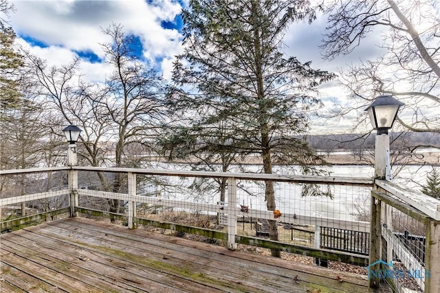 view of snow covered deck