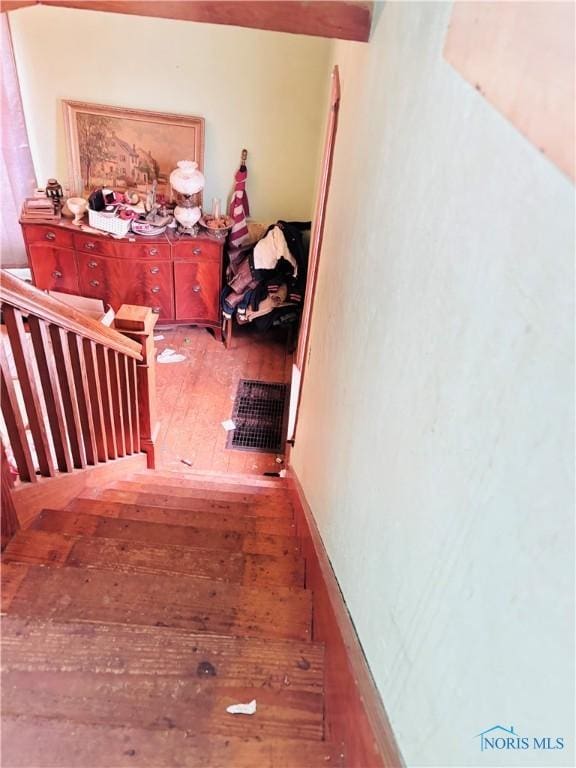 hallway featuring wood-type flooring