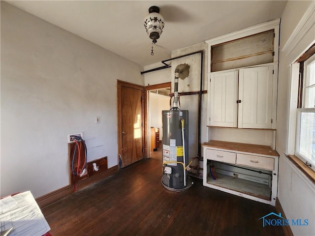 utility room with water heater