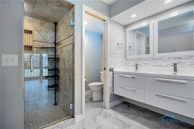 29620 Gleneagles Rd Unit C, Perrysburg, OH 43551 - full bathroom with a stall shower, marble look tile flooring, toilet, double vanity, and baseboards